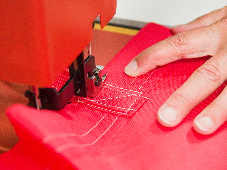 Sewing the straps with a box stitch.
